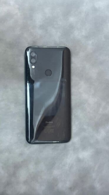 Xiaomi Redmi smartfon - Model: Redmi (arka qapaqda “Redimi” loqosu) -