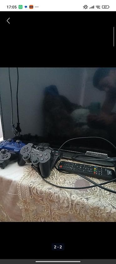 PlayStation 3 (PS3) oyun dəsti Komplekt: - PS3 Slim konsolu - 3 ədəd