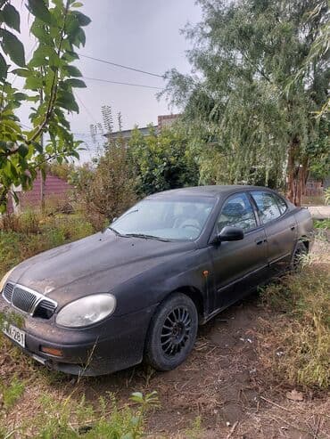 mersedes disk teker: Daewoo Leganza: 2 l | 1998 il Sedan — 3