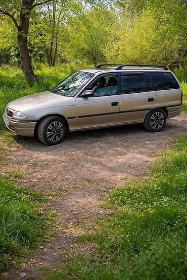 duman: Opel Astra: 1.6 l | Universal — 7