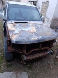 mtz 892 qiymeti: Mitsubishi Pajero IO – ağ rəngli, 5 qapılı kompakt SUV Maşının ancaq — 5