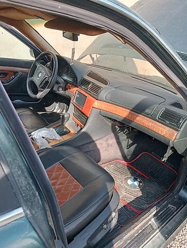 moto skuter: BMW 7 Series E38. Avtomobil göründüyü kimi mühərrik xanada balaca — 6
