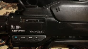 canon 1300d qiymeti: Profesional video kamera - HD çəkiliş - 12x optik, 160x rəqəmsal zoom — 7