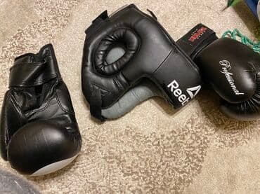 Qaçış trenajorları: Boks üçün dəst: - 1 cüt qara boks əlcəyi – “TOP TEN” bilək bandajlı — 2