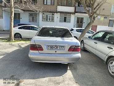 Mercedes-Benz E-Class (W210), gümüş rəngli sedan. Xüsusiyyətlər və — 7