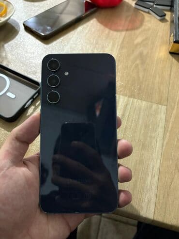 ТВ и видео: Samsung Galaxy A55, 128 ГБ, цвет - Голубой, Беспроводная зарядка — 1