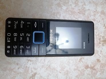 philips xenium e570: M-HORSE M5606 düyməli mobil telefon Telefon yaxşı vəziyyətdədir — 1