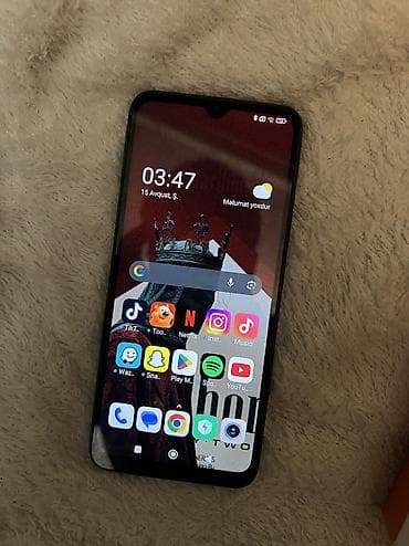 yeni modem: Poco C40, 64 GB, rəng - Qara, Sensor, Face ID — 1