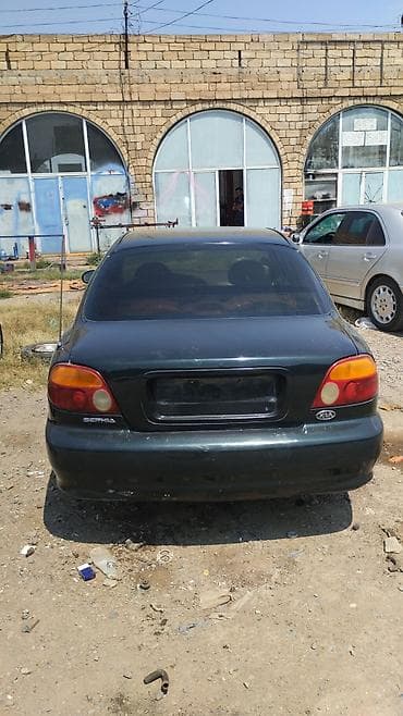 jeton satişi: Kia Sephia: 1.6 l | 1997 il Sedan — 2