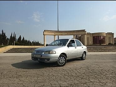 maşın satışı kredit: Kia Sephia sedan, gümüşü rəng. Kompakt ölçülü, şəhər üçün ideal 4 — 4