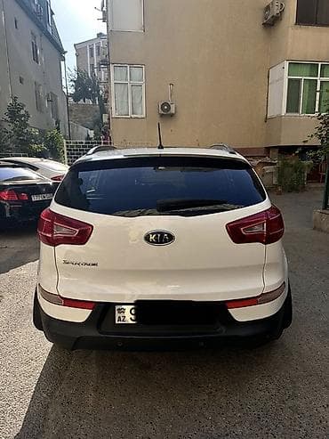 lada priora 2015: Kia Sportage: 2 l | 2010 il Krossover — 5