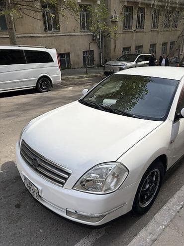 Nissan Teana, ağ rəngdə sedan Texniki xüsusiyyətlər: - Kuzov: sedan