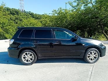 man sat: Mitsubishi Airtrek: 2 l | 2002 il 258000 km Van/Minivan — 5