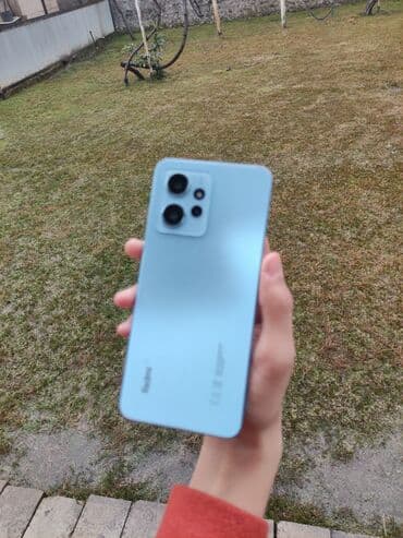 ucuz telafonlar: Redmi smartfon – açıq mavi rəng - Arxa panel: mat teksturalı — 1