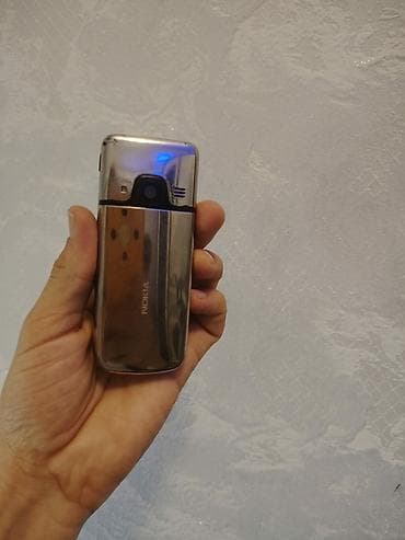 playsation 3: Nokia 8000 4G, 512 GB, rəng - Gümüşü, Düyməli, Barmaq izi, İki sim kartlı — 3