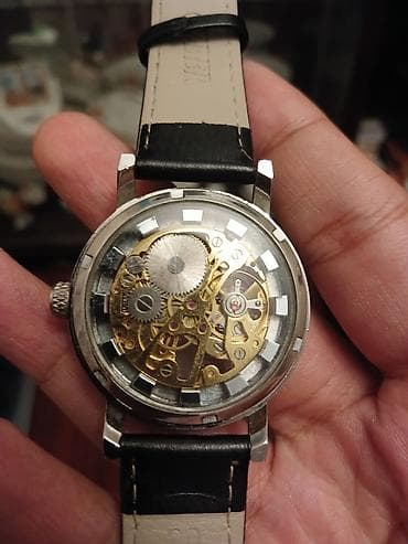 honor saatlari: Skelet mexanizmalı qol saatı - Mexanika: əl ilə quraqlanan mexaniki — 3