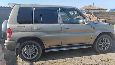 tom ford lost cherry: Mitsubishi Pajero: 1.8 l | 2000 il Sedan — 2