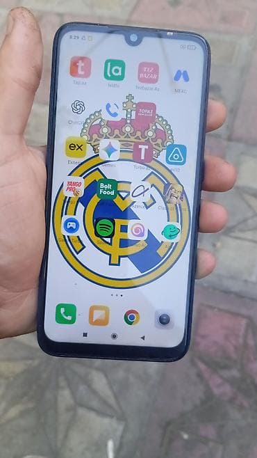 iki: Smartfon – mavi rəngdə arxa qapaqlı, barmaq izi skaneri arxada, ikiqat — 1