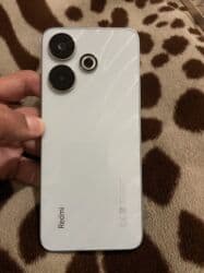 Redmi 13, 128 GB, rəng - Mavi, Kredit, Barmaq izi, İki sim kartlı lalafo.az -da Redmi 13, 128 GB, rəng - Mavi, Kredit, Barmaq izi, İki sim kartlı