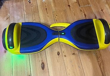 Elektrik nəqliyyatı: Özünü-balanslaşdıran skuter (hoverboard) - Rəng: sarı–mavi korpus — 1