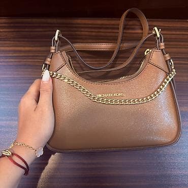 Michael Kors qadın çantası – qəhvəyi rəng, qızılı detallar. 1 dəfə lalafo.az -da Michael Kors qadın çantası – qəhvəyi rəng, qızılı detallar. 1 dəfə