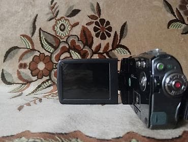 ucuz video kamera: Məhsul: Rəqəmsal videokamera (HD) Xüsusiyyətlər: - 20.0 MP foto — 6