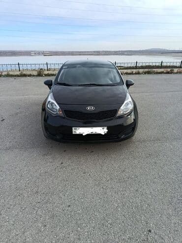 kvadrasikl satisi: Kia Rio sedan – qara rəng, 4 qapılı, kompakt şəhər avtomobili satılır — 1