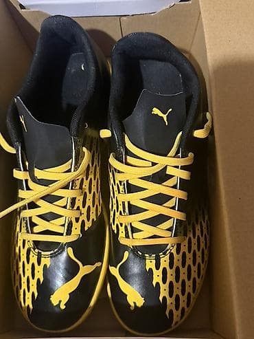 rezin bot: Puma futbol butsaları – sarı/qara rəng kombinasiyası Model kodu — 1