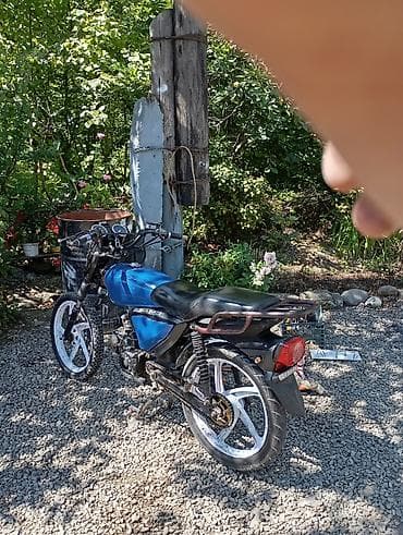 drift car elektrikli scooter: Mavi rəngli, klassik üslubda motosiklet. Şəkillərdə yan hissəsində — 3