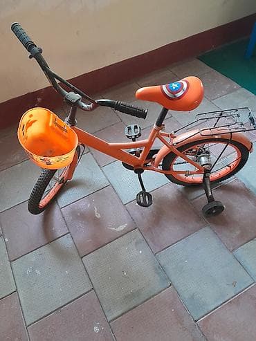 2ci əl velosipedlər: Uşaq velosipedi – narıncı rəng 6 - Təkər ölçüsü: təxminən 16" - — 1