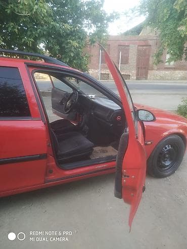 ford transit 2009: Opel Astra Vectra (ünvan nömrəsi görünür), qırmızı rəngli universal — 9