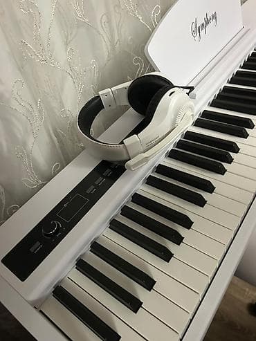 real gitara: Rəng: ağ Məhsul: rəqəmsal piano “Symphony” (stendli) Komplekt: piano + — 3