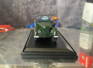 metbex tavan modelleri: Коллекционная модель ГАЗ-69 Парадный зеленый 1965 НАШ Автопром — 12