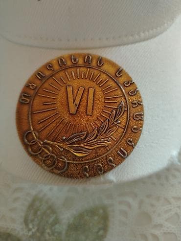 1976 dollar: Sovet dövrünə aid idman mövzulu bürünc tonlu medal/nişan. - Ön — 2