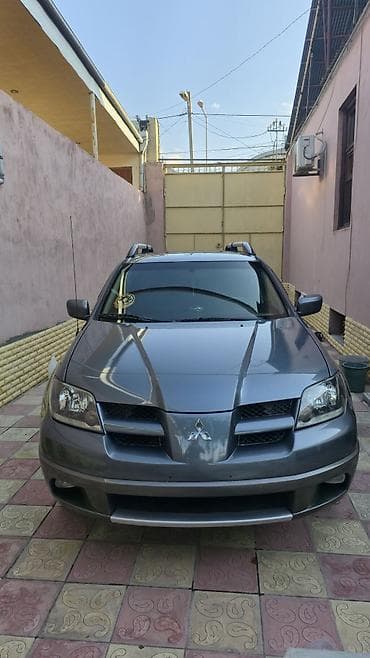 barter disk: Mitsubishi Outlander – boz rəngli, universallığı və rahatlığı ilə — 5