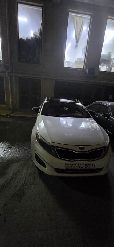 fiat doblo ölüxana: Kia Optima – ağ rəngli sedan Xarici: - Ağ kuzov, qara panoramik dam - — 1