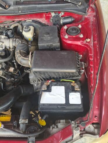 kia forte 2017: Kia Sephia: 1.6 l | 1998 il Sedan — 9