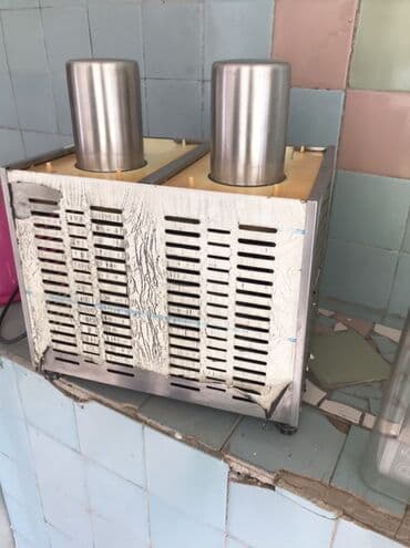 soyducu vitrin: Paslanmayan metaldan hazırlanmış iki silindrik qabı olan soyuducu — 1