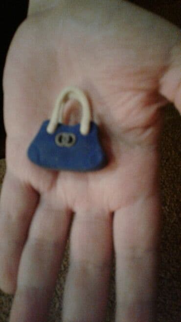 Shekilleri cevirin Ushaqlar ucun saça taxan broshka kimide olur tezedi