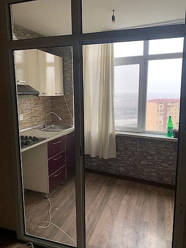 Qarajlar: Yasamal, 2 otaqlı, Yeni tikili, m. İnşaatçılar, 57 kv. m — 2