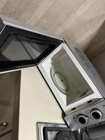 philips xenium e570: EUROLUX mikrodalğalı soba Xüsusiyyətlər: - Mexaniki idarəetmə: 2 — 2