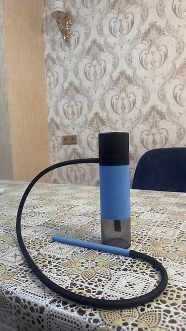 Şəxsi əşyalar: Kompakt stolüstü nərgiz (mini hookah) Xüsusiyyətlər: - Portativ — 2
