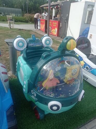 uşaq yellencekleri: Uşaqlar üçün çəhrayı rəngdə, cəlbedici dizaynlı yelləncək maşını. Bu — 3