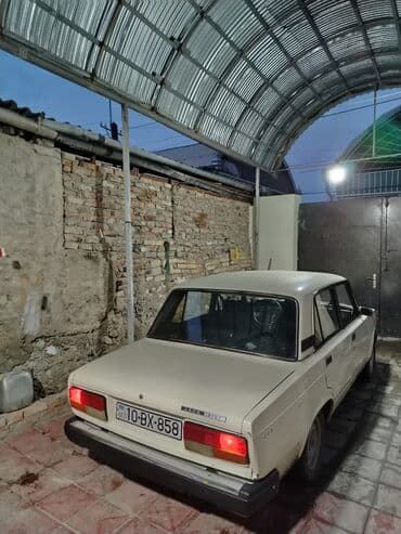 gence traktor zavodunda traktorlarin qiymeti: Avtomobil: Lada 2107 (sedan) Rəng: Açıq bej/ivory Dövlət nömrə nişanı — 2