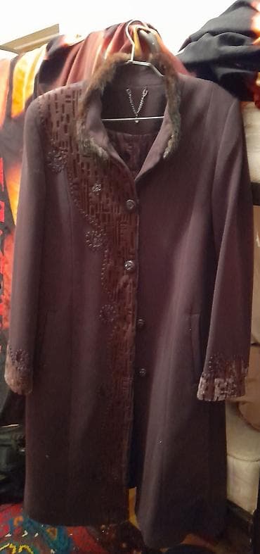 Темно коричневое пальто. Новое . Размер 50-52. Длинное, очень удобное