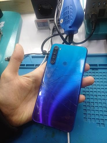 iphone 16e qiymet: Xiaomi Redmi smartfon - Model: Redmi seriyası (mavi-bənövşəyi arxa — 2