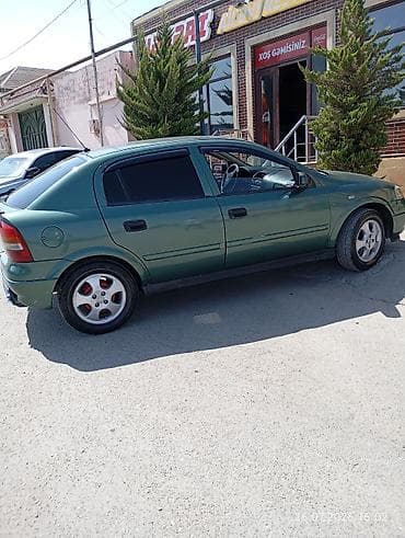 Opel Astra: 1.6 l | 1999 il 228965 km Sedan — 8