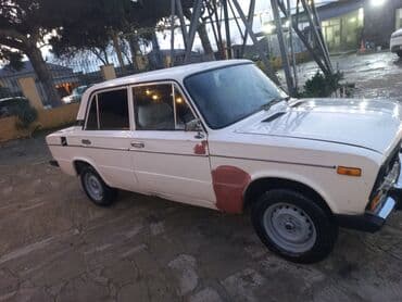 kia sportage benzin: VAZ 2106, ağ rəng, 4 qapılı sedan. - Klassik xarici görünüş: xrom ön — 5