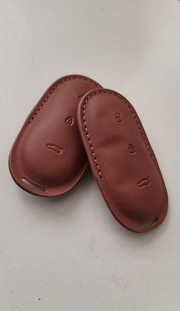 avtomobil çxolları: Dəri avtomobil açarı üçün qoruyucu qol (2 ədəd) LI6/7/9 - Material — 1