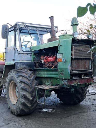 инвертор с 12 на 220 вольт: Yaşıl rəngdə olan bu traktor təsərrüfat işləri üçün yararlıdır. Kənd — 5